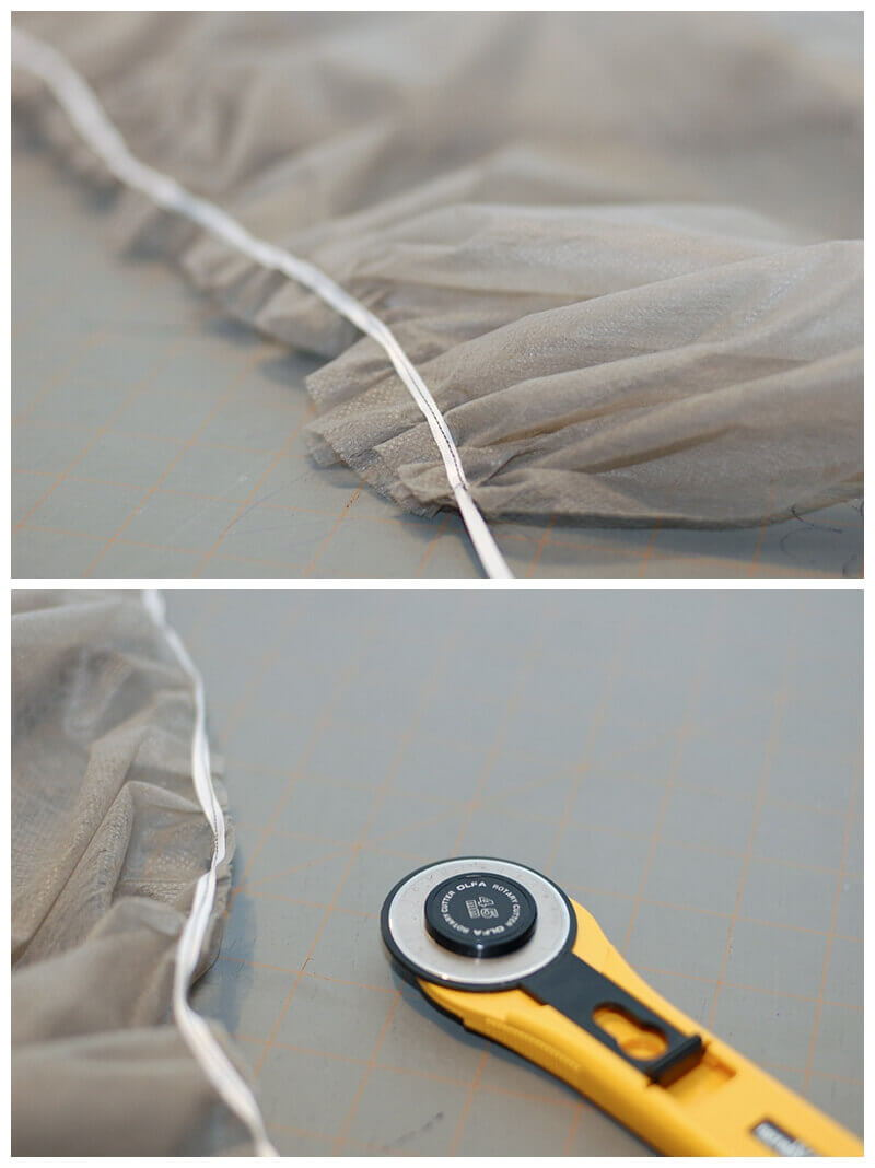 Under layer of a tulle cape being gathered and sewn to a ribbon.