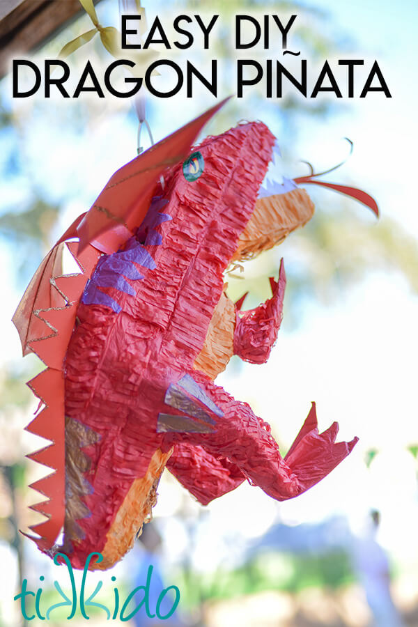 Smaug piñata made from a store bought dinosaur piñata, with text overlay reading "Easy DIY Dragon Piñata."