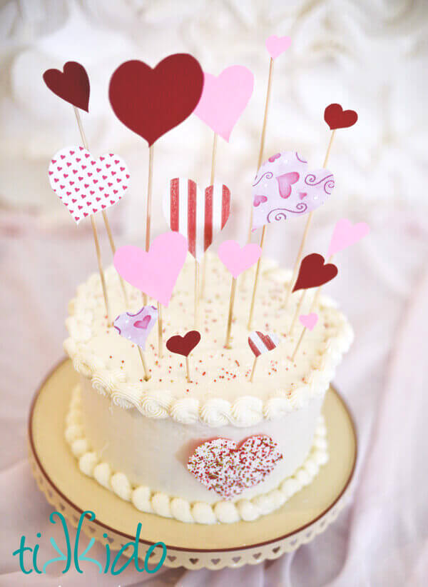 Simple cake decorated with and easy paper Valentine's Day Cake Topper.
