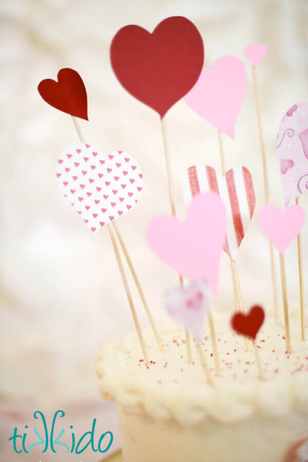 Valentine's Day Cake Topper Dramatic, easy Valentine's Day Cake Topper on top of a plain white cake.