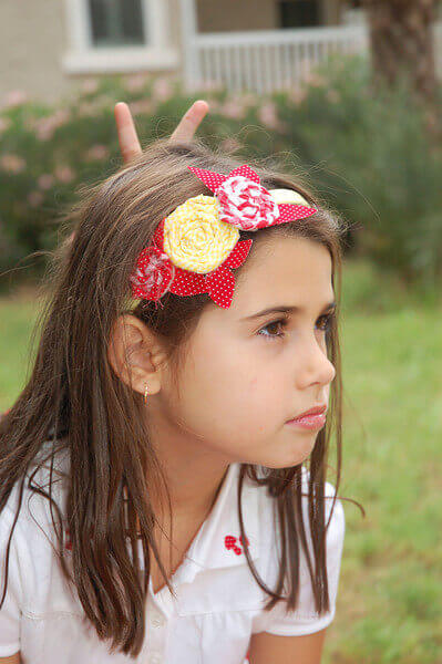 Twisted Fabric Flowers Easy twisted fabric flowers used to make a charming headband.